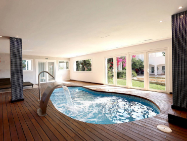 Heated indoor pool overlooking the gardens