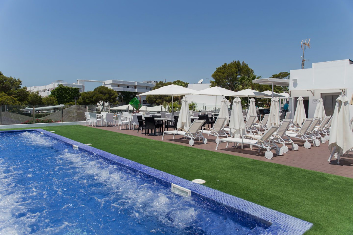 Partial view of the pool and sunbathing area