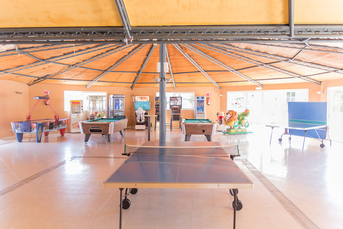 General view of the arcade and games room at Hotel Club Es Talaial