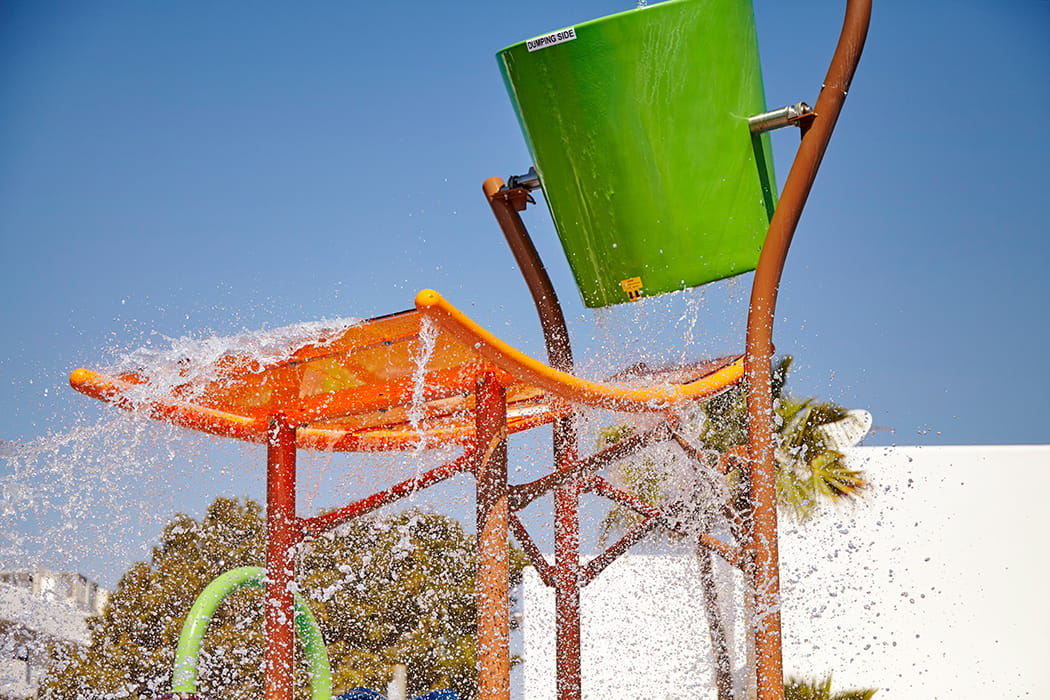 Close-up of one of the water buckets of the splash zone